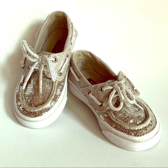 silver sperry shoes